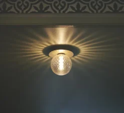 Applique murale, Liila 1 medium, or, transparent, IP44, Ø16,5cm, H17cm - Nuura